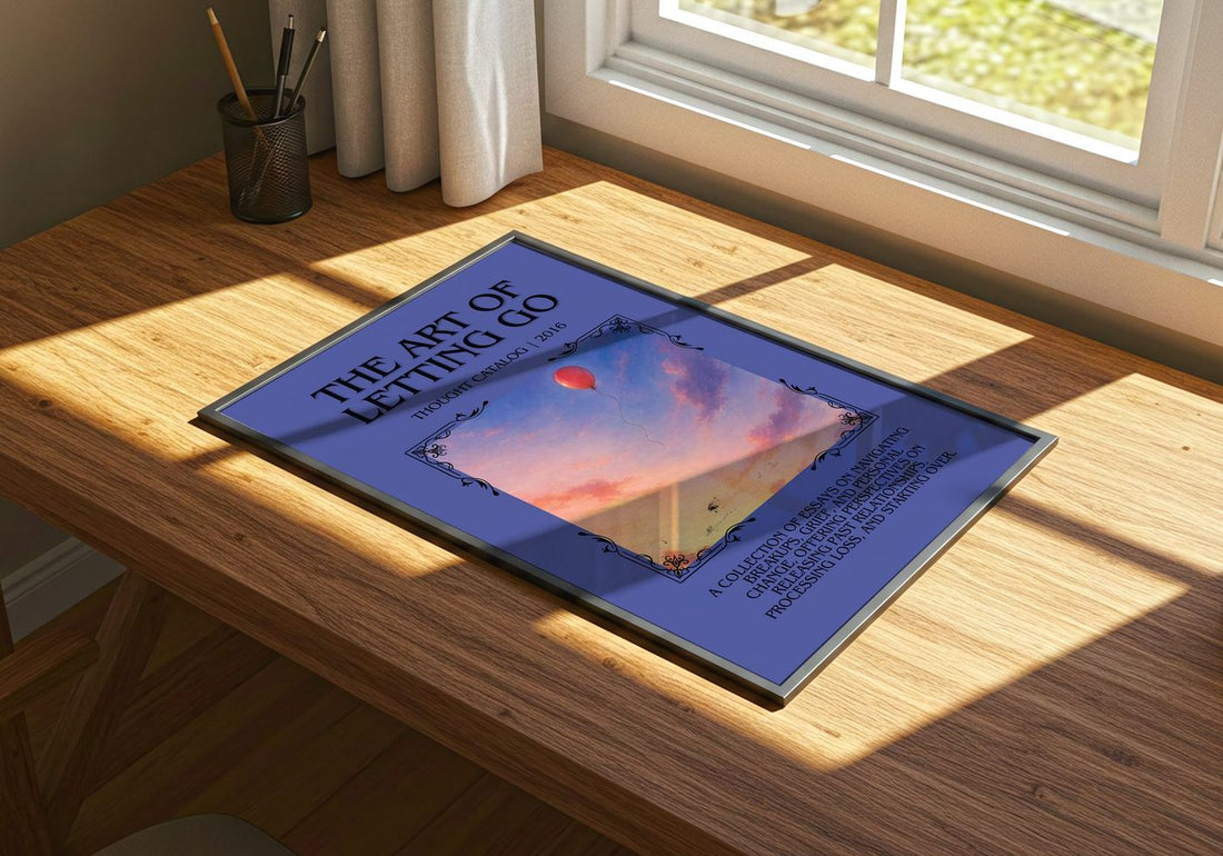 The Art of Letting Go Minimalist Book Poster by Thought Catalog – print on a sunlit desk
