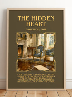 The Hidden Heart Minimalist Book Poster by Gayle Buck – framed print leaning on a wooden floor