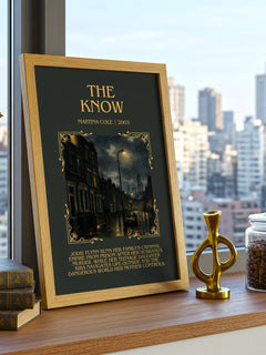 The Know Minimalist Book Poster by Martina Cole – framed print on a city-view windowsill