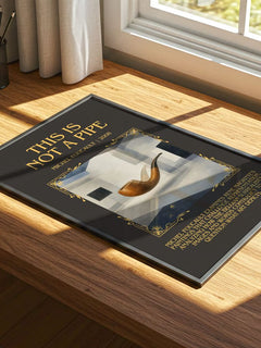 This Is Not a Pipe Minimalist Book Poster by Michel Foucault – print on a sunlit desk