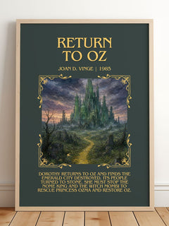 Return to Oz Minimalist Book Poster by Joan D. Vinge – framed print leaning on a wooden floor