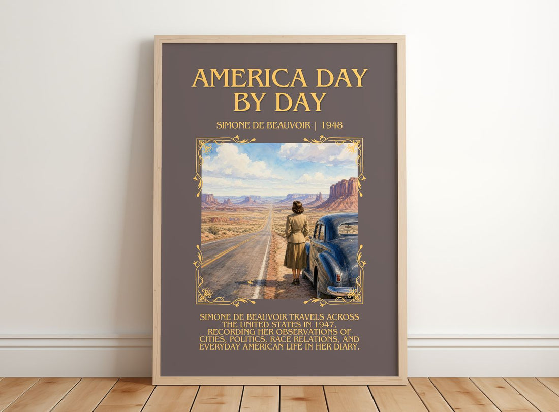 America Day by Day Minimalist Book Poster by Simone de Beauvoir – framed print leaning on a wooden floor
