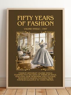 Fifty years of fashion Minimalist Book Poster by Valerie Steele – framed print leaning on a wooden floor