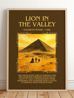 Lion in the valley Minimalist Book Poster by Elizabeth Peters – framed print leaning on a wooden floor