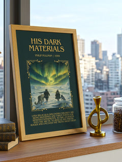 His Dark Materials Minimalist Book Poster by Philip Pullman – framed print on a city-view windowsill