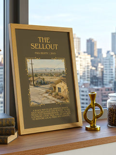 The Sellout Minimalist Book Poster by Paul Beatty – framed print on a city-view windowsill