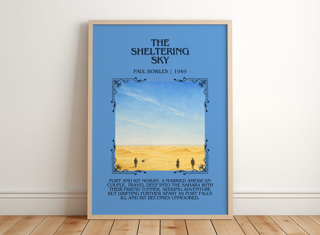 The Sheltering Sky Minimalist Book Poster by Paul Bowles – framed print leaning on a wooden floor