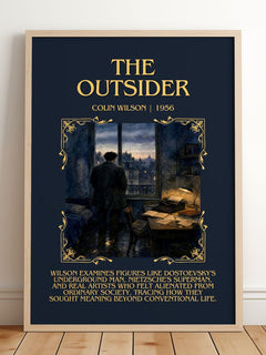 The Outsider Minimalist Book Poster by Colin Wilson – framed print leaning on a wooden floor