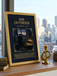 The Outsider Minimalist Book Poster by Colin Wilson – framed print on a city-view windowsill