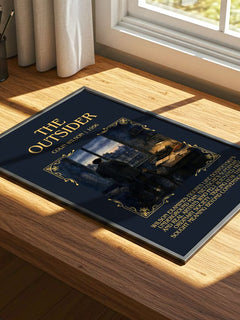 The Outsider Minimalist Book Poster by Colin Wilson – print on a sunlit desk