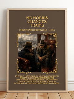 Mr Norris Changes Trains Minimalist Book Poster by C. Isherwood – framed print leaning on a wooden floor