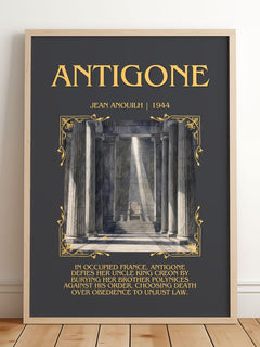 Antigone Minimalist Book Poster by Jean Anouilh – framed print leaning on a wooden floor