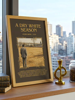 A Dry White Season Minimalist Book Poster by Andre Brink – framed print on a city-view windowsill