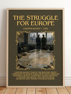 The Struggle for Europe Minimalist Book Poster by Chester Wilmot – framed print leaning on a wooden floor