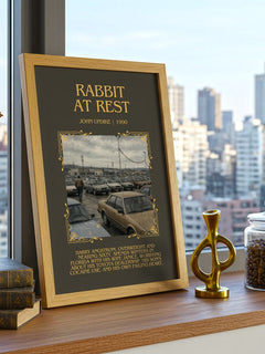 Rabbit at Rest Minimalist Book Poster by John Updike – framed print on a city-view windowsill