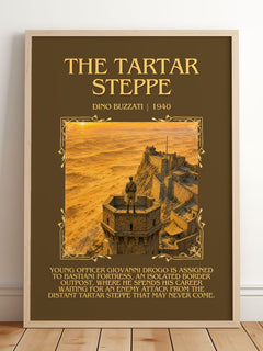 The Tartar Steppe Minimalist Book Poster by Dino Buzzati – framed print leaning on a wooden floor