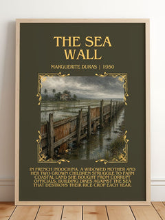 The Sea Wall Minimalist Book Poster by Marguerite Duras – framed print leaning on a wooden floor