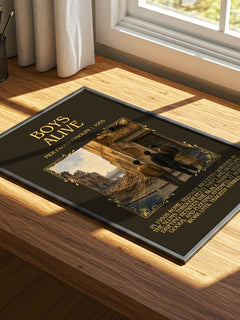 Boys Alive Minimalist Book Poster by Pier Paolo Pasolini – print on a sunlit desk