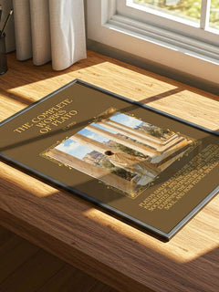 The Complete Works of Plato Minimalist Book Poster by Plato – print on a sunlit desk