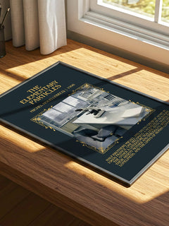 The Elementary Particles Minimalist Book Poster by Michel Houellebecq – print on a sunlit desk