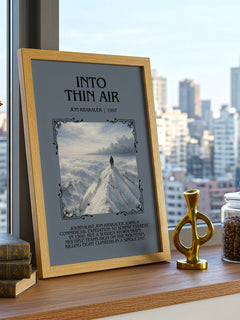 Into Thin Air Minimalist Book Poster by Jon Krakauer – framed print on a city-view windowsill
