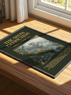 The Sixth Extinction Minimalist Book Poster by Elizabeth Kolbert – print on a sunlit desk