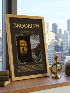 Brooklyn Minimalist Book Poster by Colm Toibin – framed print on a city-view windowsill