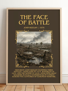 The Face of Battle Minimalist Book Poster by John Keegan – framed print leaning on a wooden floor