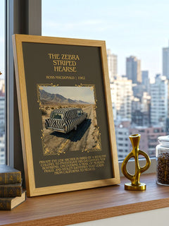 The Zebra Striped Hearse Minimalist Book Poster by Ross Macdonald – framed print on a city-view windowsill