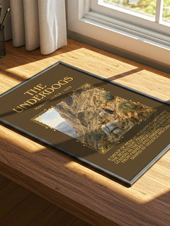 The Underdogs Minimalist Book Poster by Mariano Azuela – print on a sunlit desk