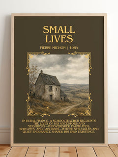 Small Lives Minimalist Book Poster by Pierre Michon – framed print leaning on a wooden floor