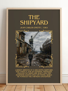 The Shipyard Minimalist Book Poster by Juan Carlos Onetti – framed print leaning on a wooden floor