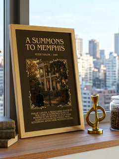 A Summons to Memphis Minimalist Book Poster by Peter Taylor – framed print on a city-view windowsill