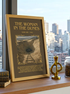 The Woman in the Dunes Minimalist Book Poster by Kobo Abé – framed print on a city-view windowsill