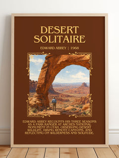 Desert Solitaire Minimalist Book Poster by Edward Abbey – framed print leaning on a wooden floor