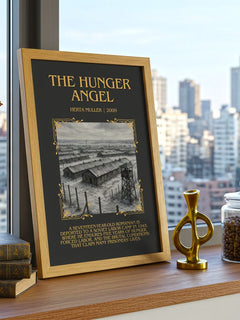 The Hunger Angel Minimalist Book Poster by Herta Müller – framed print on a city-view windowsill