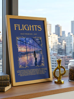 Flights Minimalist Book Poster by Olga Tokarczuk – framed print on a city-view windowsill