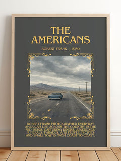The Americans Minimalist Book Poster by Robert Frank – framed print leaning on a wooden floor