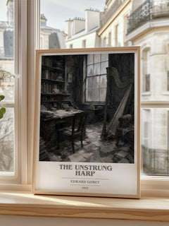 The Unstrung Harp book cover print in frame leaning in hallway – literary fiction wall art
