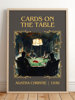Cards on the Table Classic Book Art Print by Agatha Christie – framed print leaning on a wooden floor