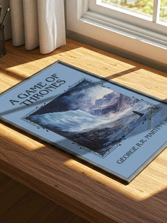 A Game Of Thrones Classic Book Art Print by George R.R. Martin – print on a sunlit desk
