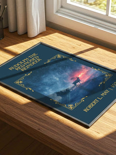 Rudolph The Red-Nosed Reindeer Classic Book Art Print by Robert L. May – print on a sunlit desk