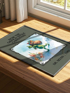 How The Grinch Stole Christmas Classic Book Art Print by Dr. Seuss – print on a sunlit desk