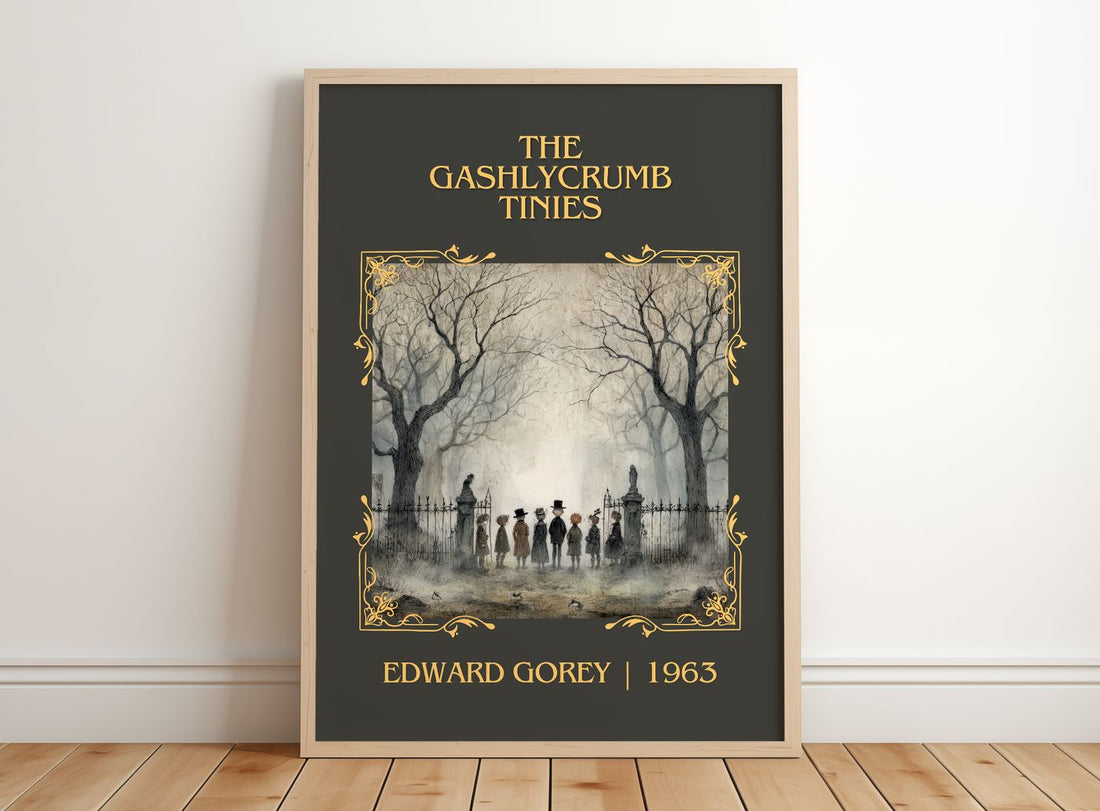 The Gashlycrumb Tinies Classic Book Art Print by Edward Gorey – framed print leaning on a wooden floor