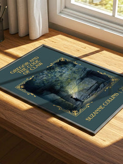 Gregor And The Code Of Claw Classic Book Art Print by Suzanne Collins – print on a sunlit desk