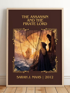 Assassin And The Pirate Lord Classic Book Art Print by Sarah J. Maas – framed print leaning on a wooden floor