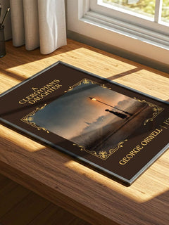 A Clergyman'S Daughter Classic Book Art Print by George Orwell – print on a sunlit desk