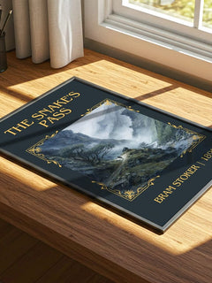 The Snake'S Pass Classic Book Art Print by Bram Stoker – print on a sunlit desk