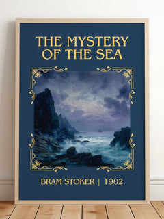 The Mystery Of The Sea Classic Book Art Print by Bram Stoker – framed print leaning on a wooden floor