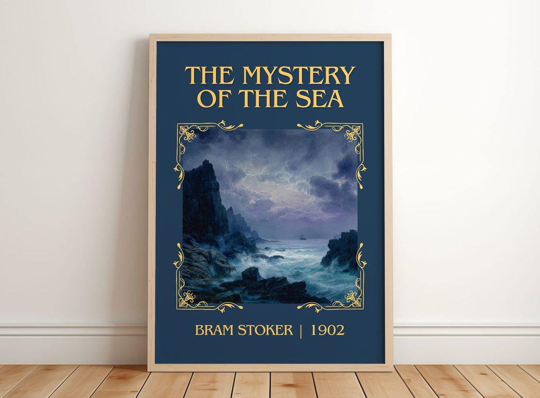 The Mystery Of The Sea Classic Book Art Print by Bram Stoker – framed print leaning on a wooden floor